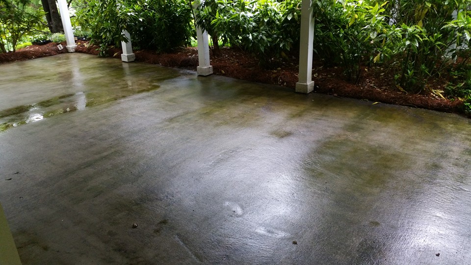 Concrete patio on a Dunwoody GA Home - Before Pressure Washing.